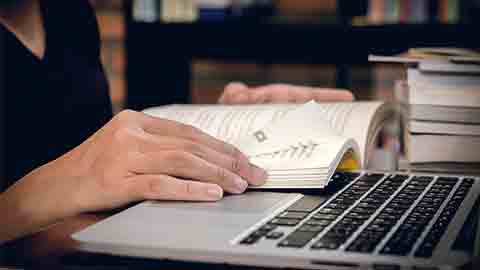 studying at laptop studying at laptop