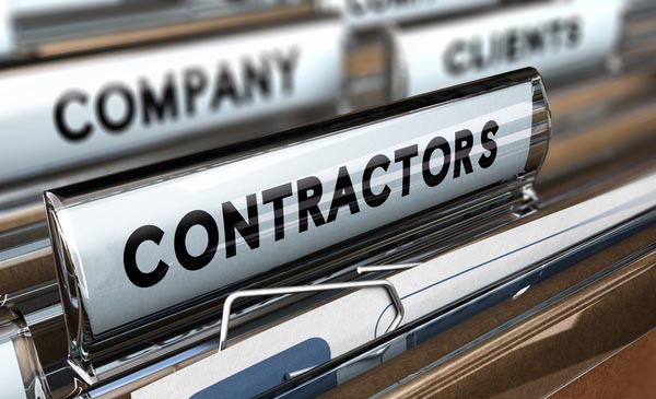 Close up on a file tab with the word contractors, focus on the main word and blur effect.