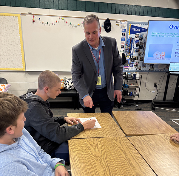 Jim Bolek, CPP, instructs students in Money Matters.