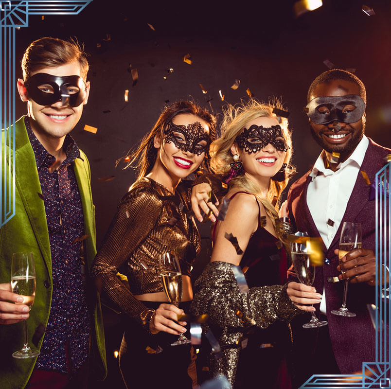 Men and women dressed in Roaring '20s styles and domino masks.