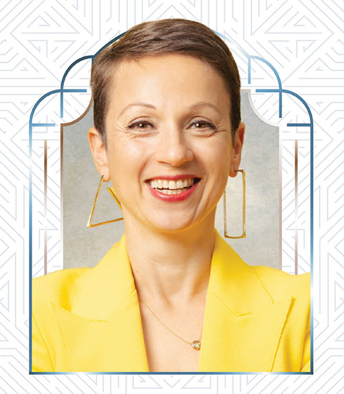 Keynote Speaker Nataly Kogan framed by an abstract Art Deco design